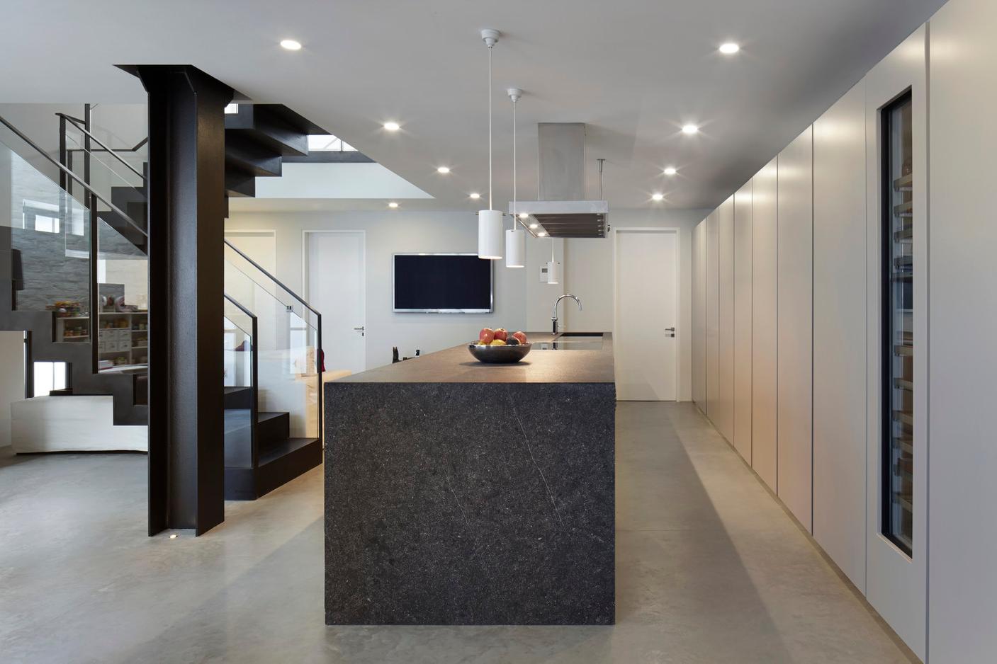 Kitchen includes natural stone with visible fossils